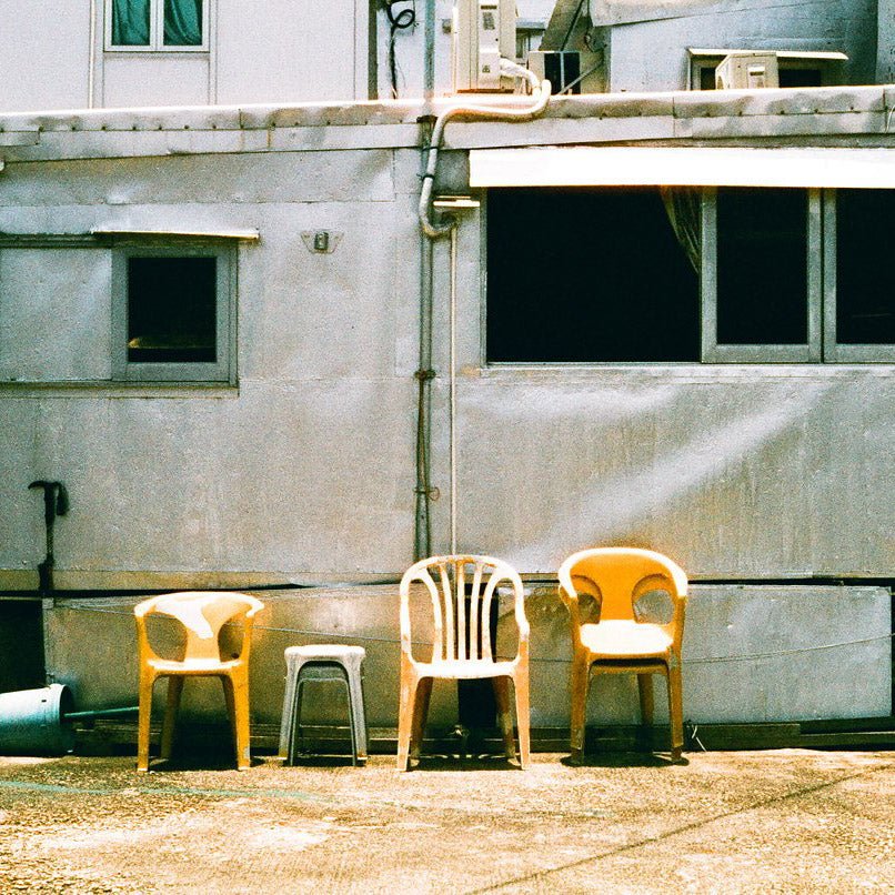 four plastic chairs - Harman Phoenix 200 ISO medium format colour negative film example image