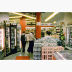 two people inside a supermarket - Harman Phoenix II 200 ISO 35mm colour negative film example image