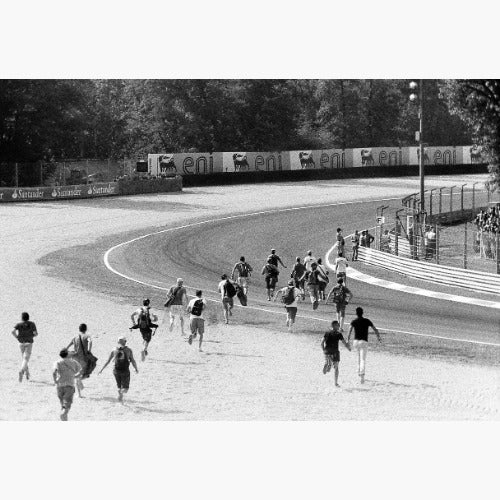 people running across race track - Ilford HP5 Plus 400 ISO 35mm black and white film example image