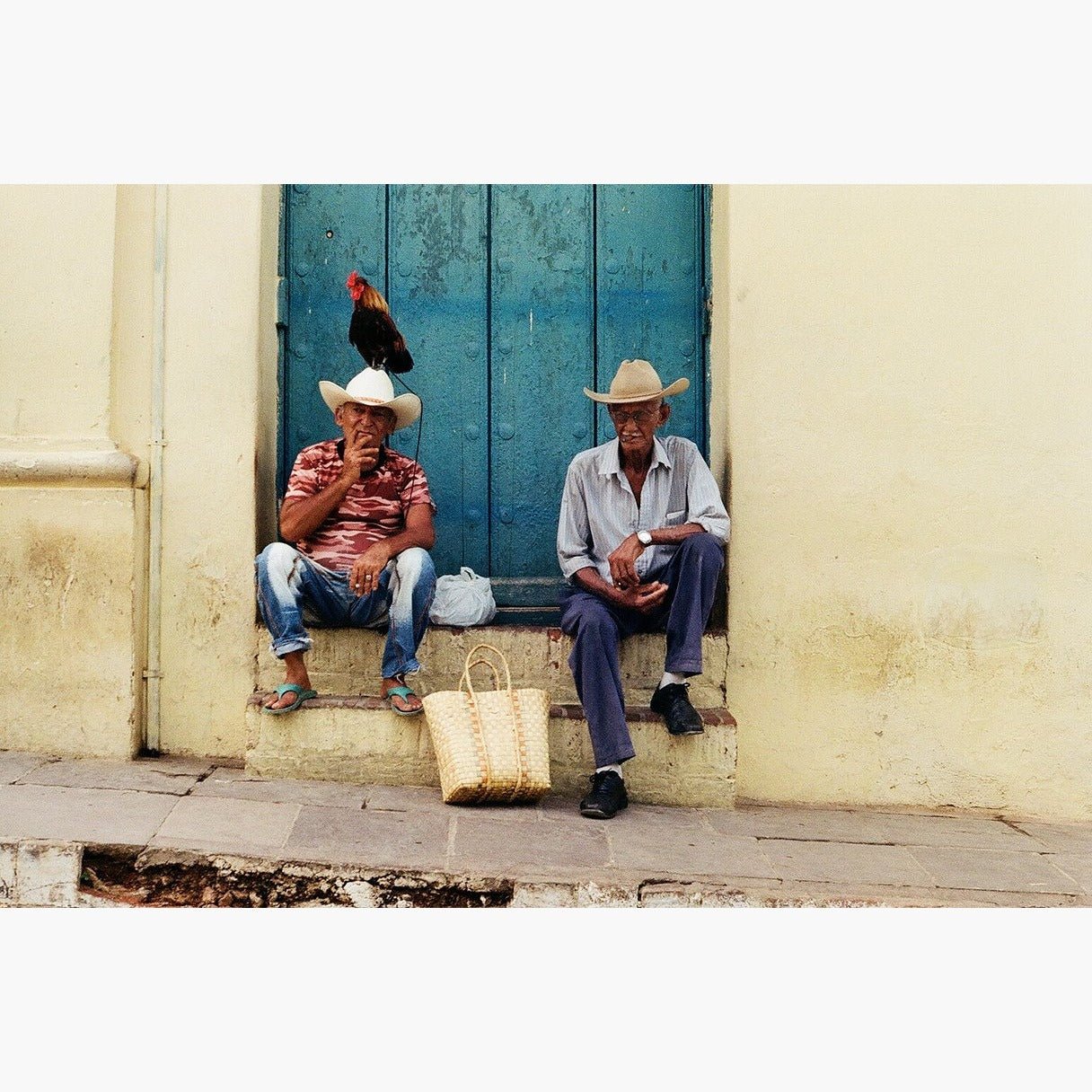 two people sitting on doorstep - Kodak Gold 200 ISO 35mm colour negative film example image